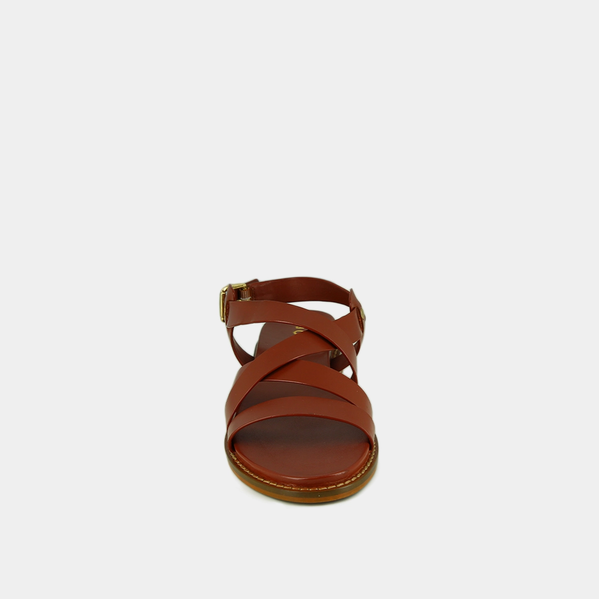 Sandals with criss-cross straps and adjustable buckles in cognac leather | WOKY