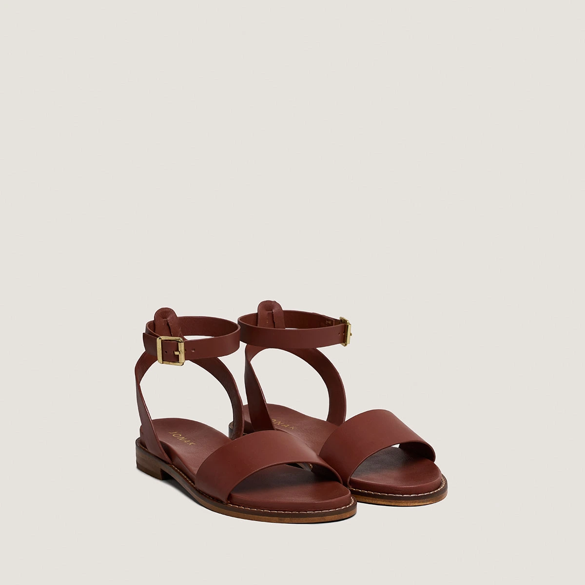 Sandals with straps and adjustable buckles in cognac leather | WIK
