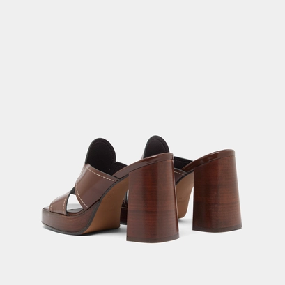 Heeled mules in brown glazed leather | belle
