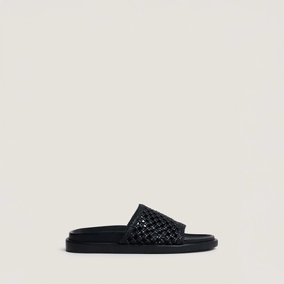 Openwork mules in black leather | wozart