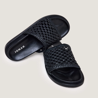Openwork mules in black leather | wozart