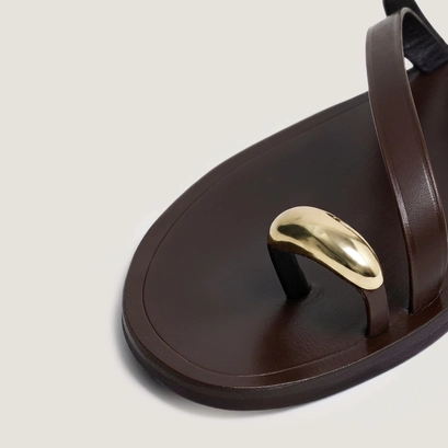 Sandals with slender straps and gold details in dark brown leather | wife