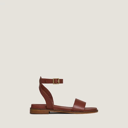 Sandals with straps and adjustable buckles in cognac leather | wik