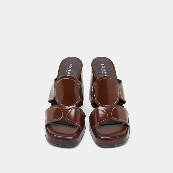 Heeled mules in brown glazed leather | BELLE