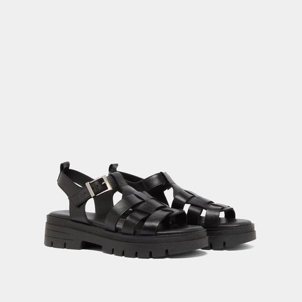 Sandals with notched soles in black leather | ANASTASIA