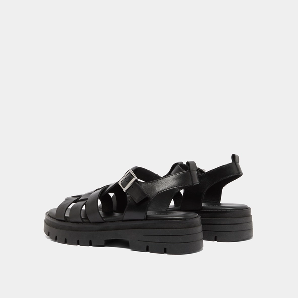 Sandals with notched soles in black leather | ANASTASIA