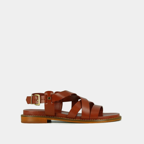 Sandals with criss-cross straps and adjustable buckles in cognac leather | WOKY