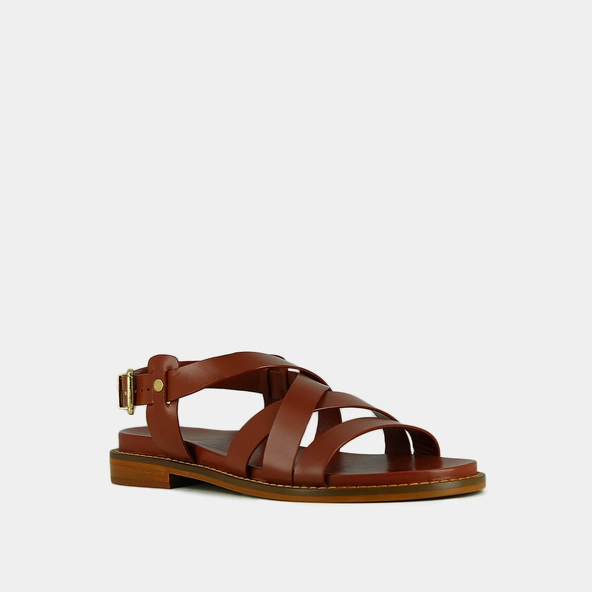 Sandals with criss-cross straps and adjustable buckles in cognac leather | WOKY