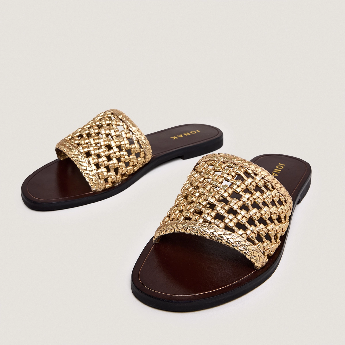 Openwork beach sandals in gold metallic leather | WISSEL
