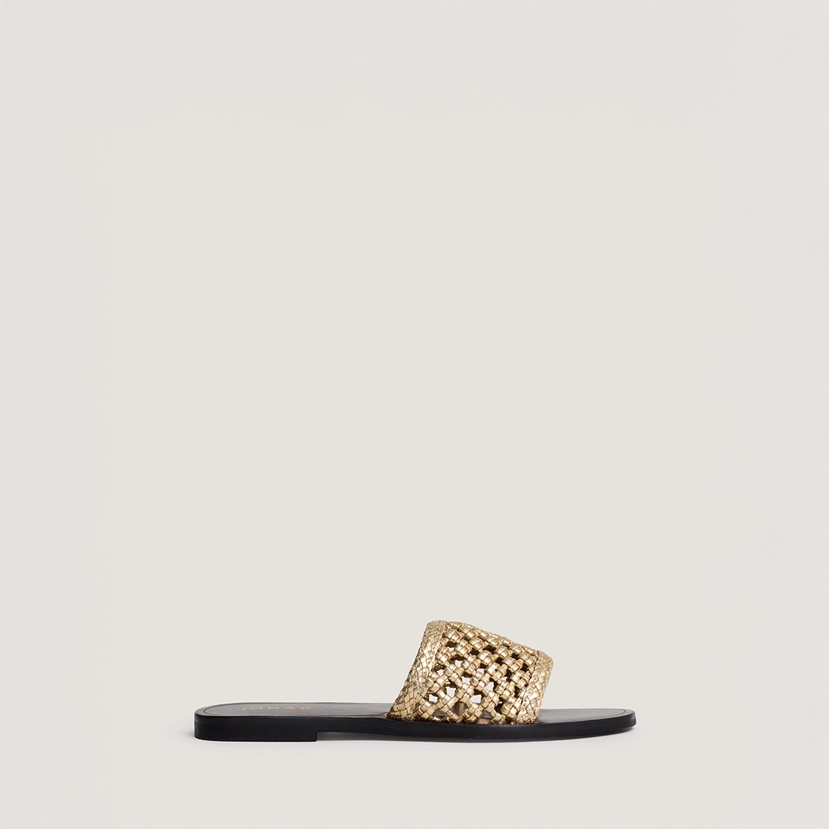 Openwork beach sandals in gold metallic leather | WISSEL