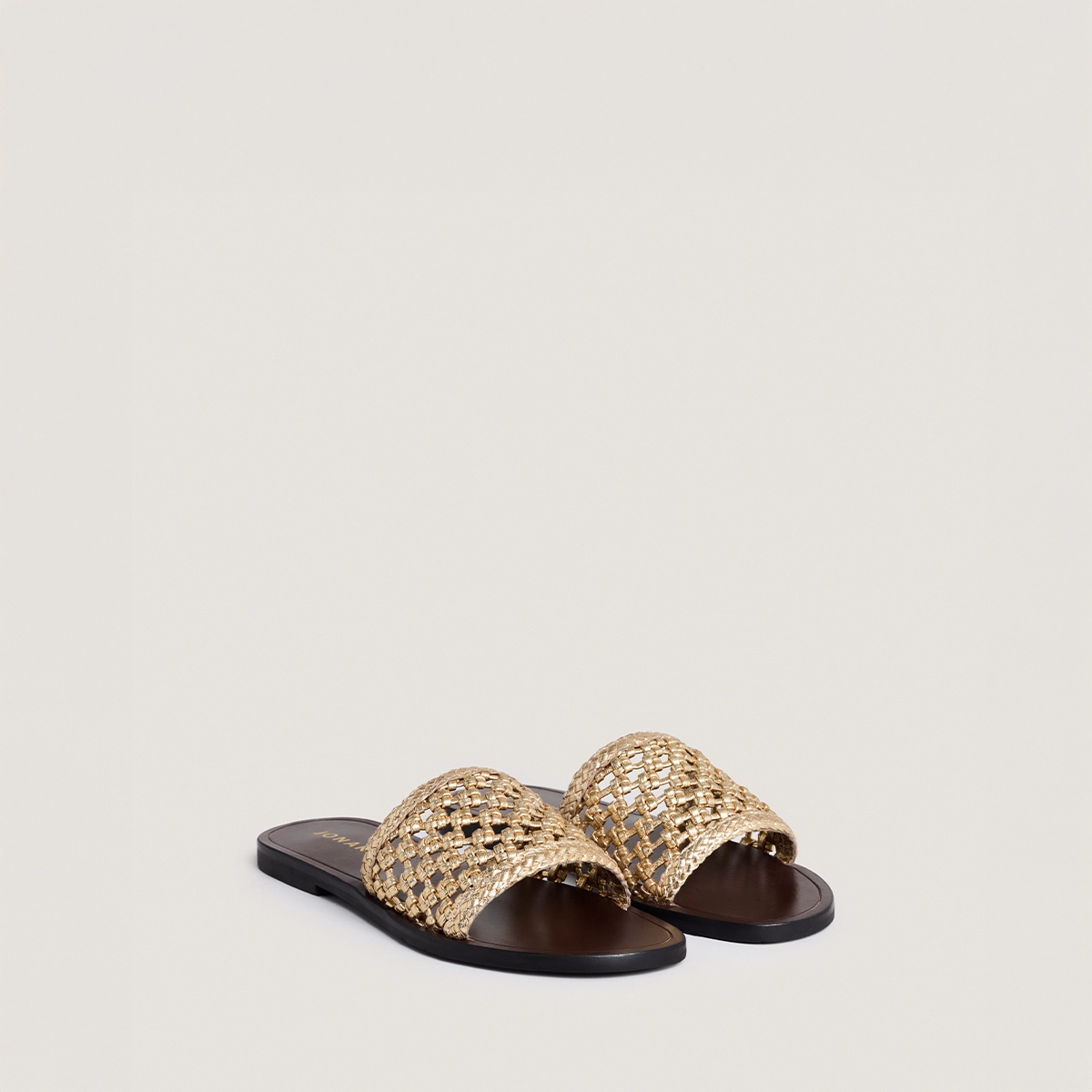 Openwork beach sandals in gold metallic leather | WISSEL