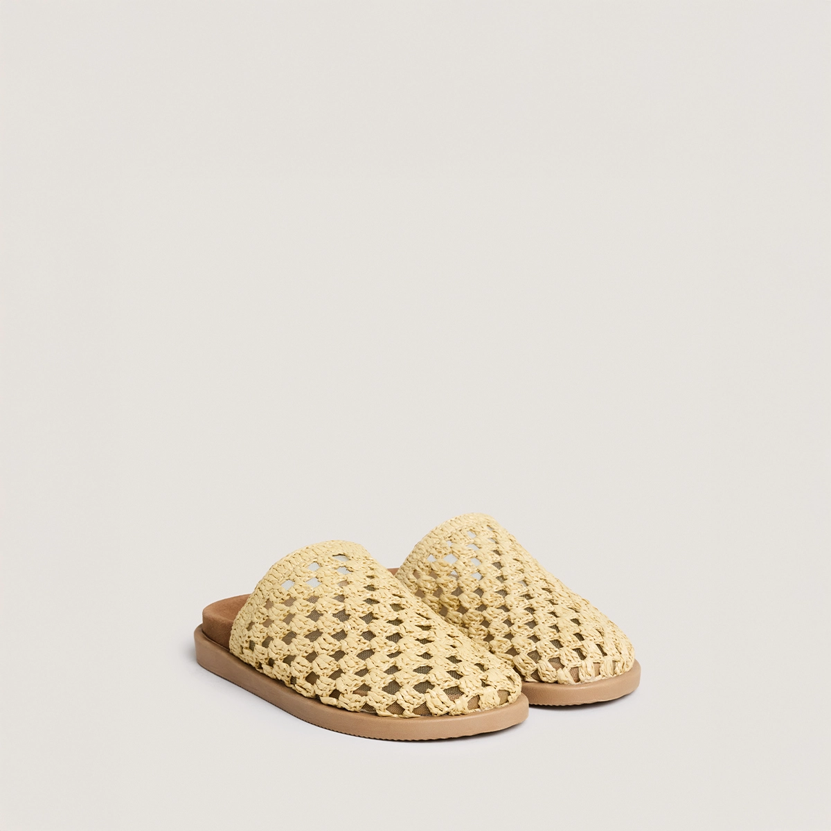 Openwork mules in beige raffia | WOLFANG