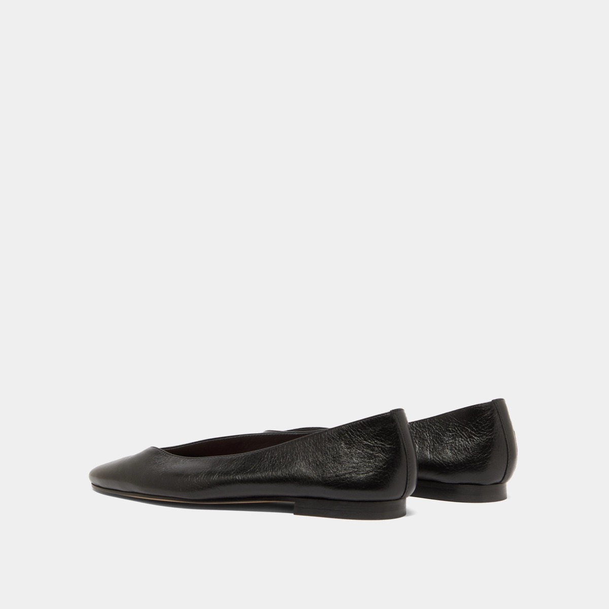 Pointed-toe ballet flats in black distressed leather | DASSUS