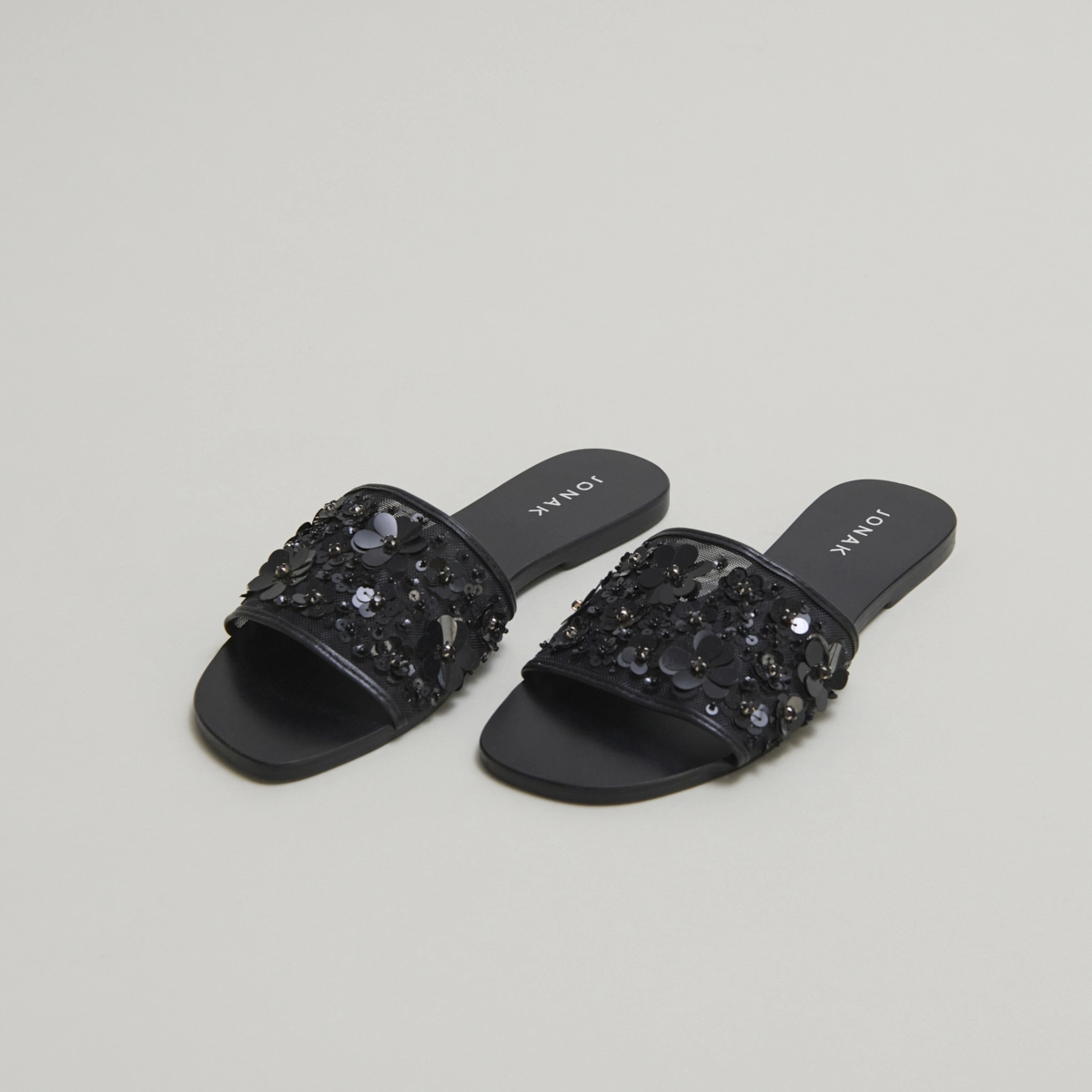 Beach sandals with flowers in black leather and black textile | SUN