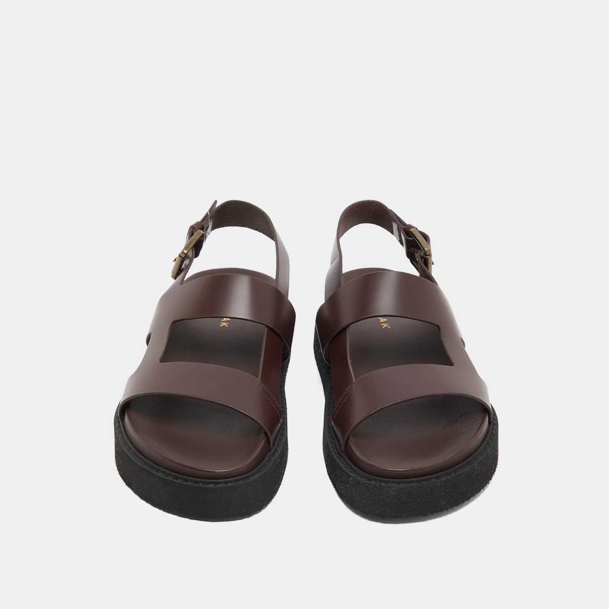 Cross-strap sandals in dark brown glazed leather | LAGUNE