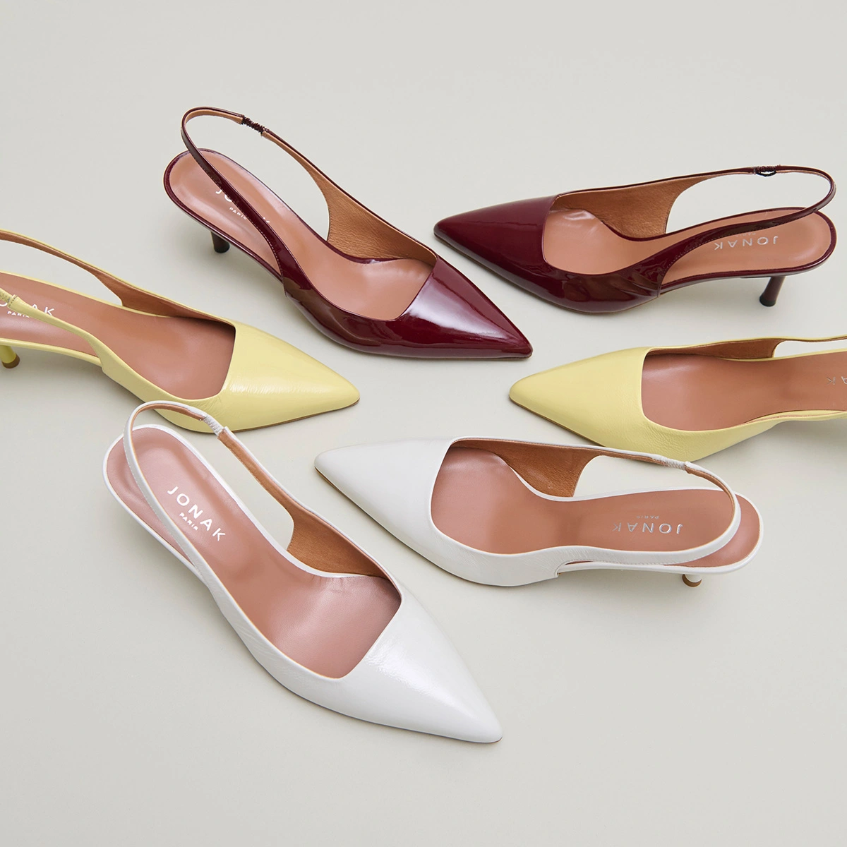 Pointed-toe pumps in pearl pleated varnish | DIAMANTINE