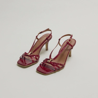 Heeled sandals with monograms in red carmine shiny leather | voma