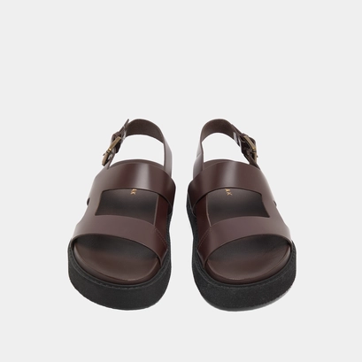 Cross-strap sandals in dark brown glazed leather | lagune