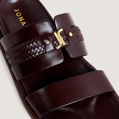Monogrammed mules in dark brown leather | wac