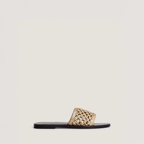 Openwork beach sandals in gold metallic leather | WISSEL