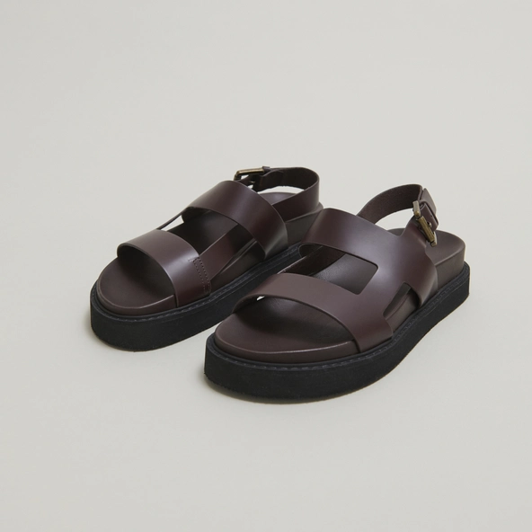 Cross-strap sandals in dark brown glazed leather | LAGUNE