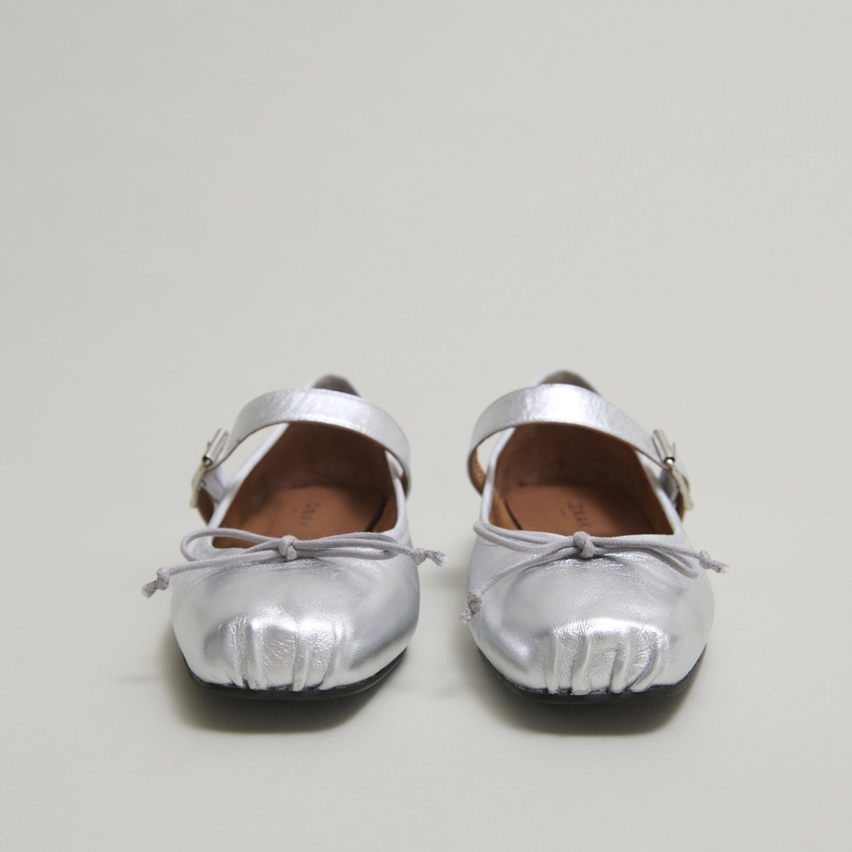 Ballet flats with adjustable buckles in silver metallic leather | DOMINANTE