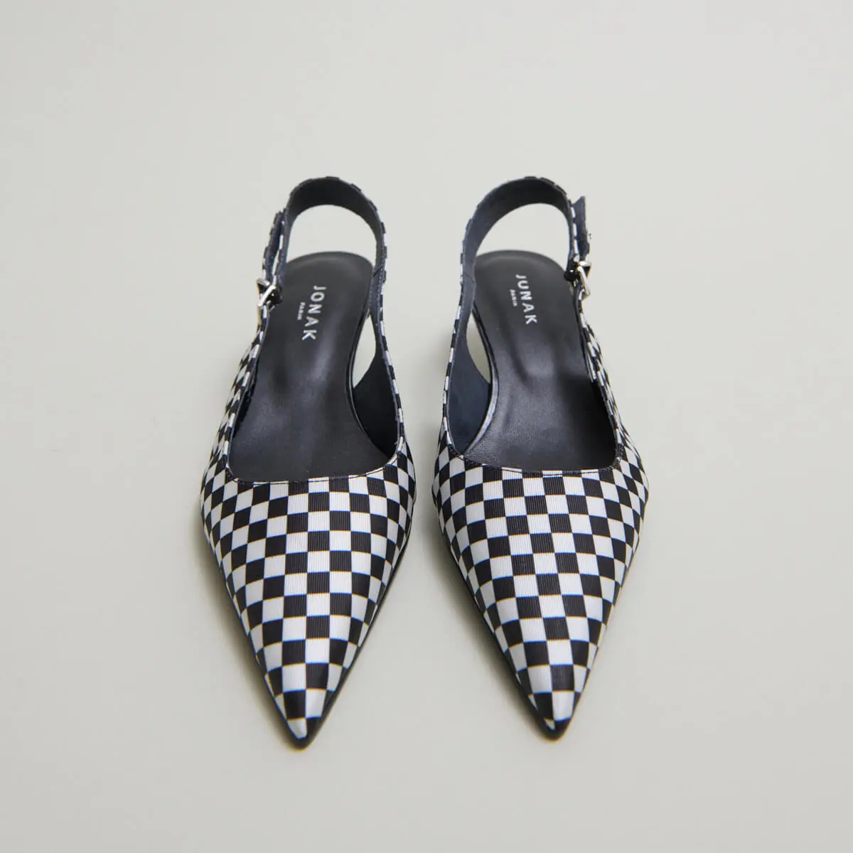 Heeled pumps with adjustable buckles in black and white textile | DOUALA
