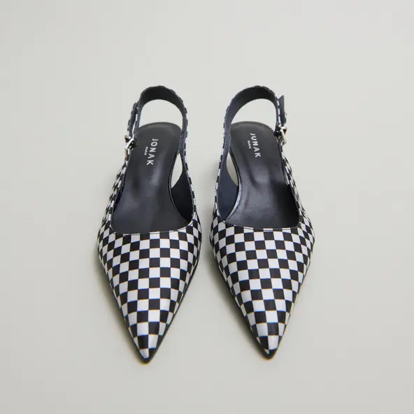 Heeled pumps with adjustable buckles in black and white textile | DOUALA