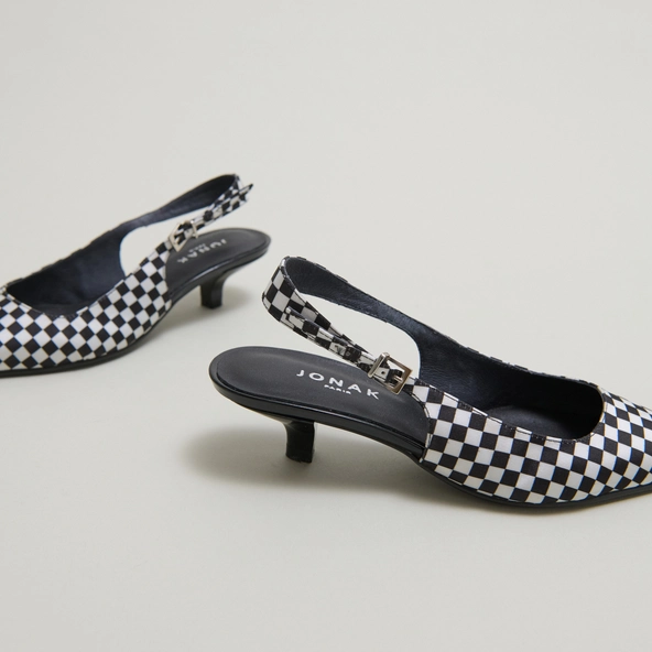 Heeled pumps with adjustable buckles in black and white textile | DOUALA