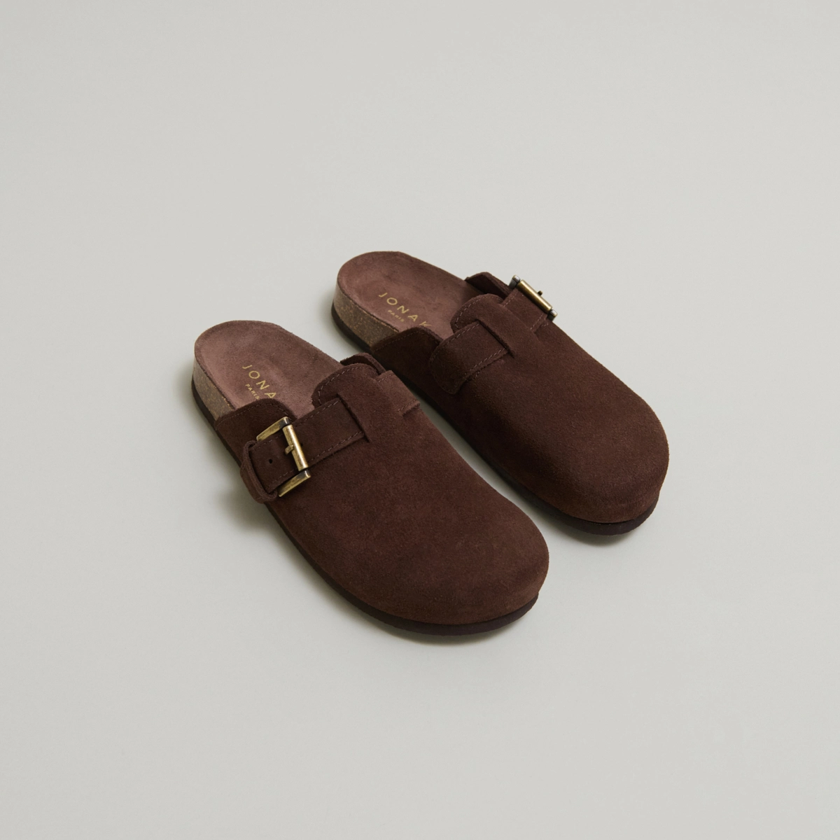 Mules with buckles in brown crust | MUNCH
