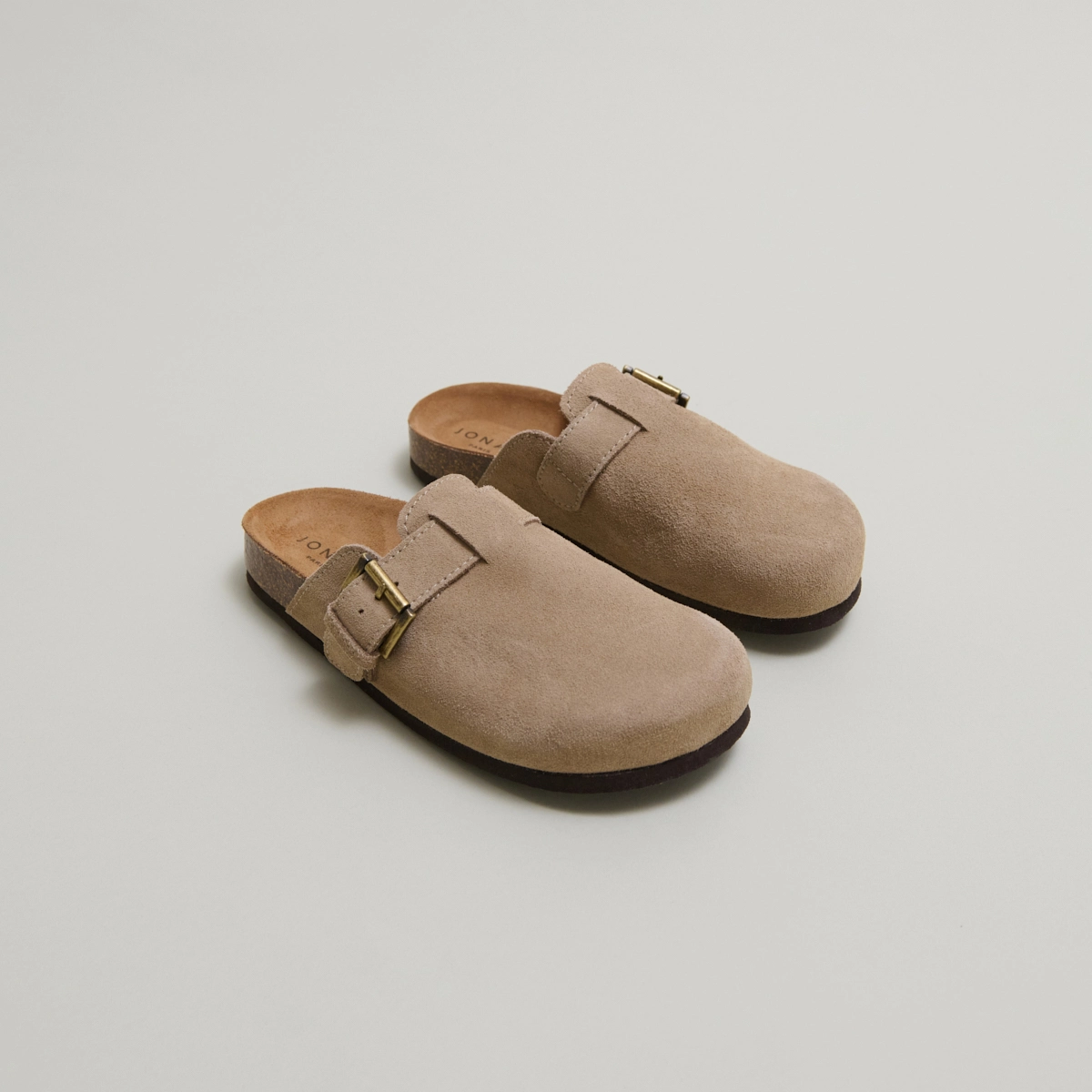 Buckle Mules in taupe crust | MUNCH