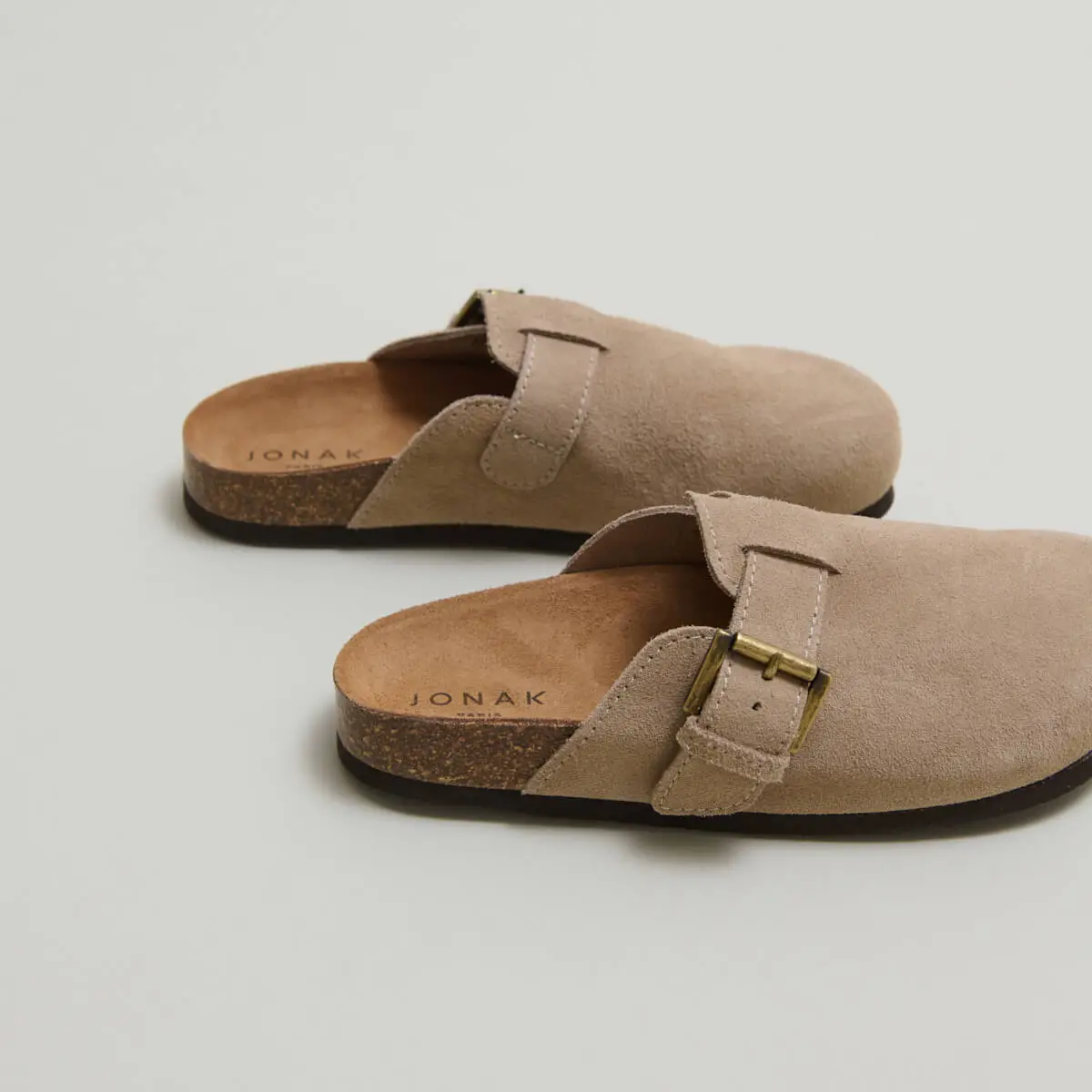 Buckle Mules in taupe crust | MUNCH