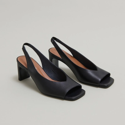 Slingback pumps in black leather | dicton