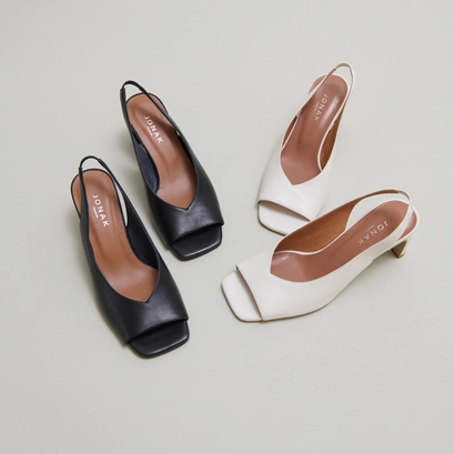 Slingback pumps in black leather | dicton