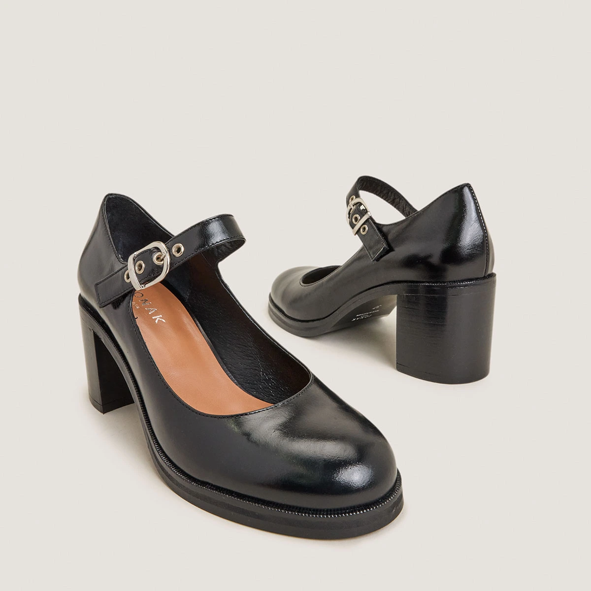 Heeled Babies in black leather | VRENI