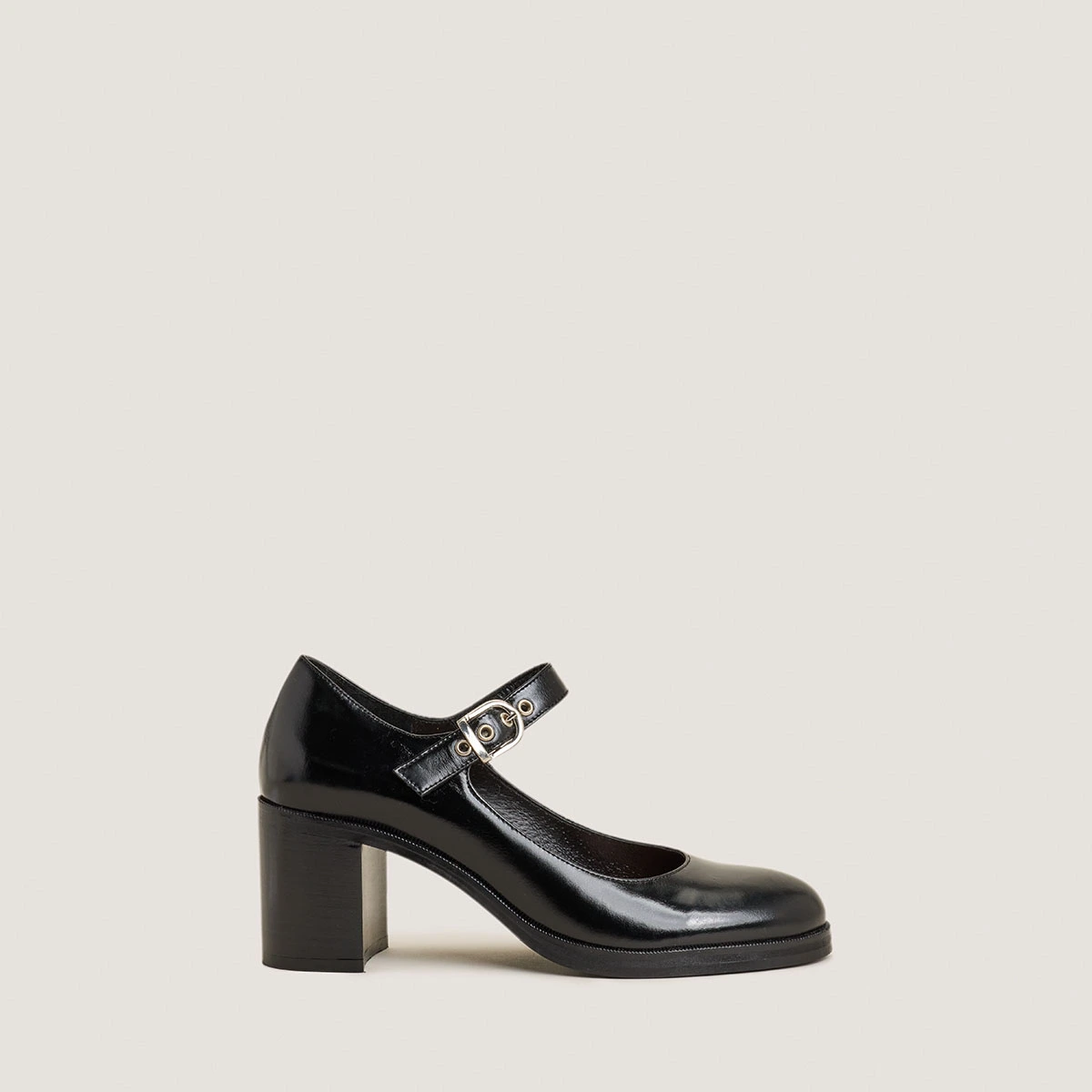 Heeled Babies in black leather | VRENI