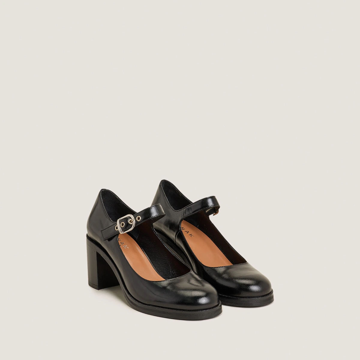 Heeled Babies in black leather | VRENI