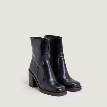 High-Heel Platform Booties in aged black leather | benicio