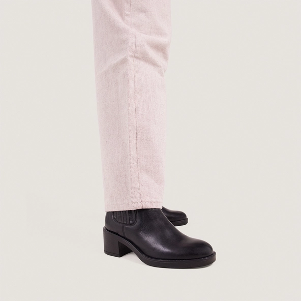 Heeled Boots in black leather | COLETTE