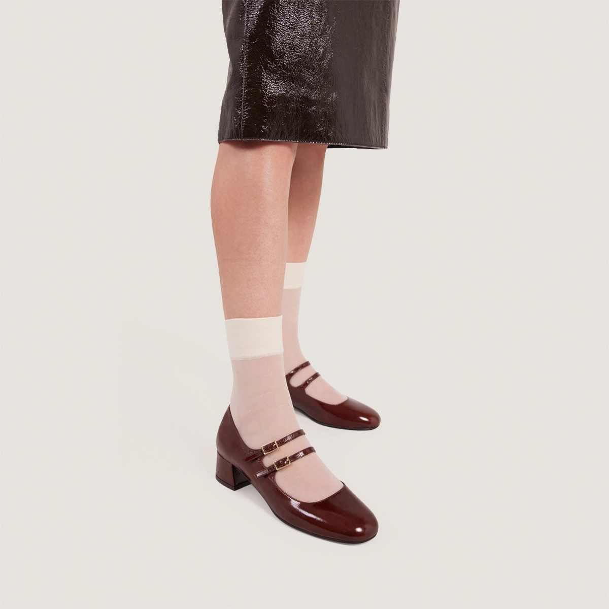 Mary Janes with double straps in shiny brown leather | DUNY