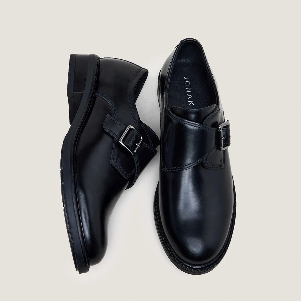 Buckle derbies in glazed black leather | ATLANTIS