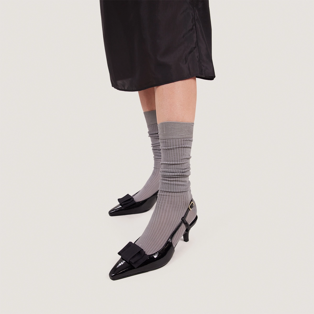 Bow Pumps in pleated black patent leather | DALO