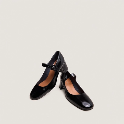 Heeled mary janes in pleated black patent leather | dittus