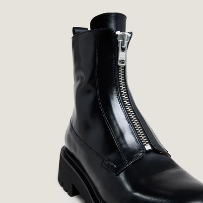 Boots with zippers in black leather | amoureuse