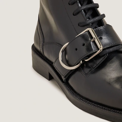 Lace-up boots with buckles in black leather | disabelle