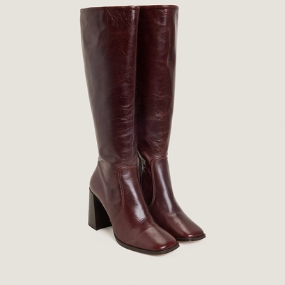 High-heeled boots in aged chocolate leather | vauby