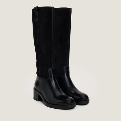 Heeled boots in black leather and suede | claire