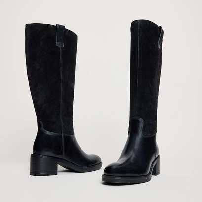 Heeled boots in black leather and suede | claire