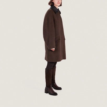 Heeled boots in dark brown leather | claire