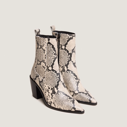 Heeled ankle boots with ruching in black and white reptile leather | basama